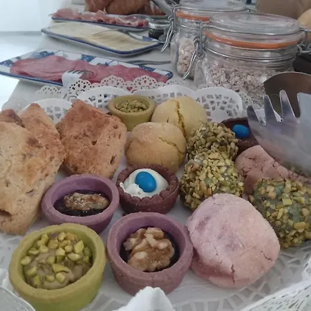 Luchia فندق مبيت وإفطار أروسييْ
